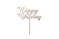 Ein Caketopper mit der Aufschrift Happy Birthday