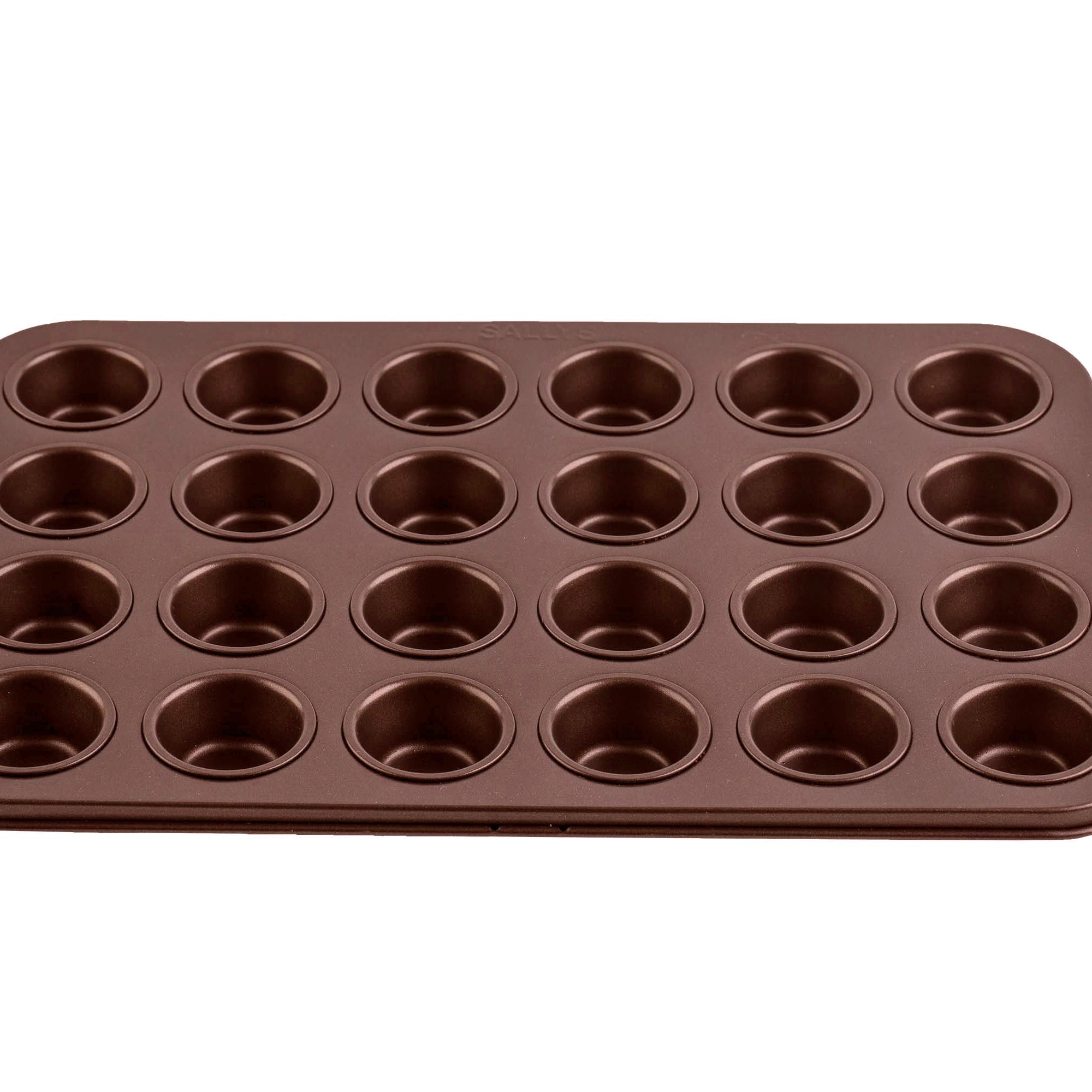 Eine kupferfarbene Mini Muffinform