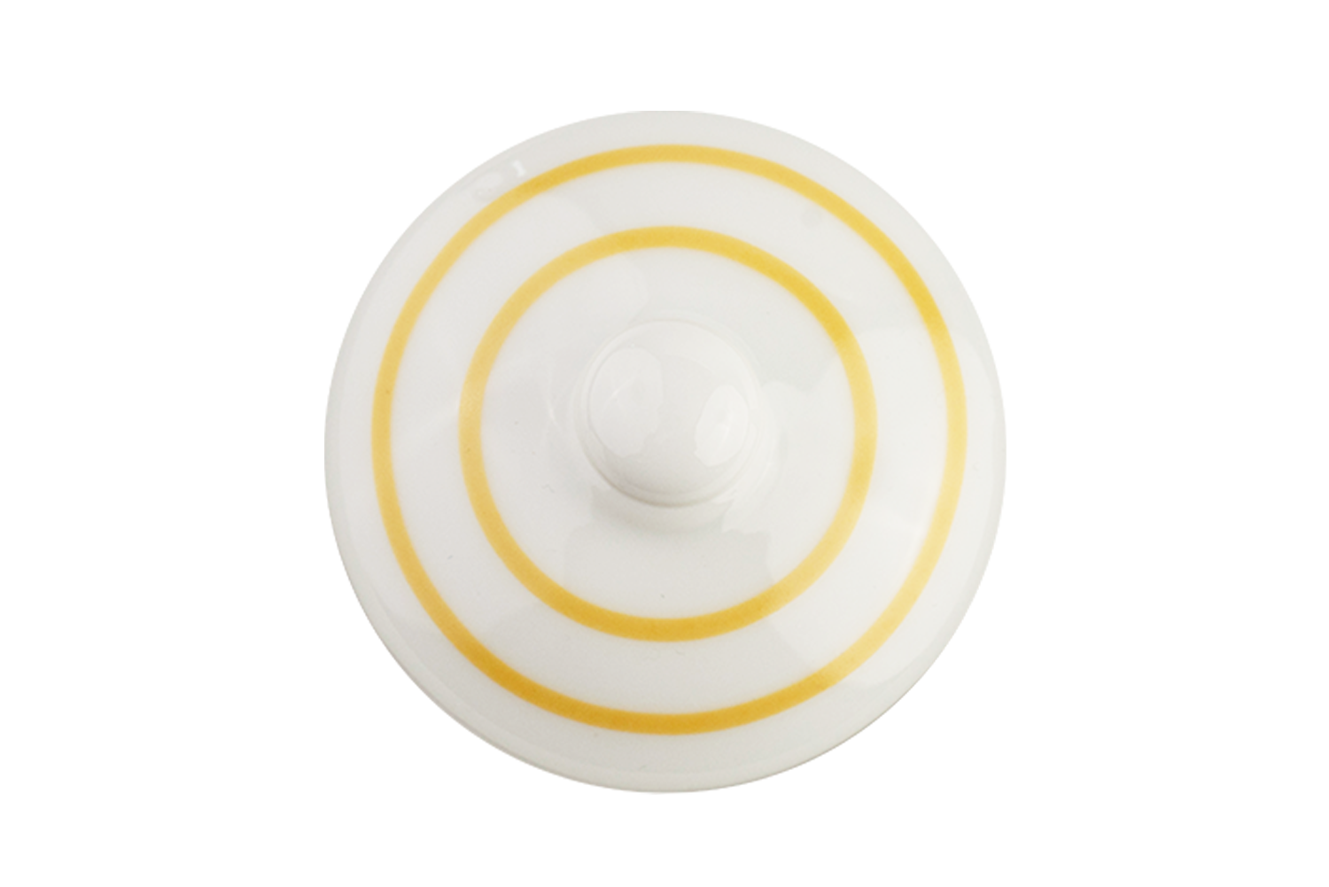 Ein gelb-gestreifter Deckel einer Teekanne