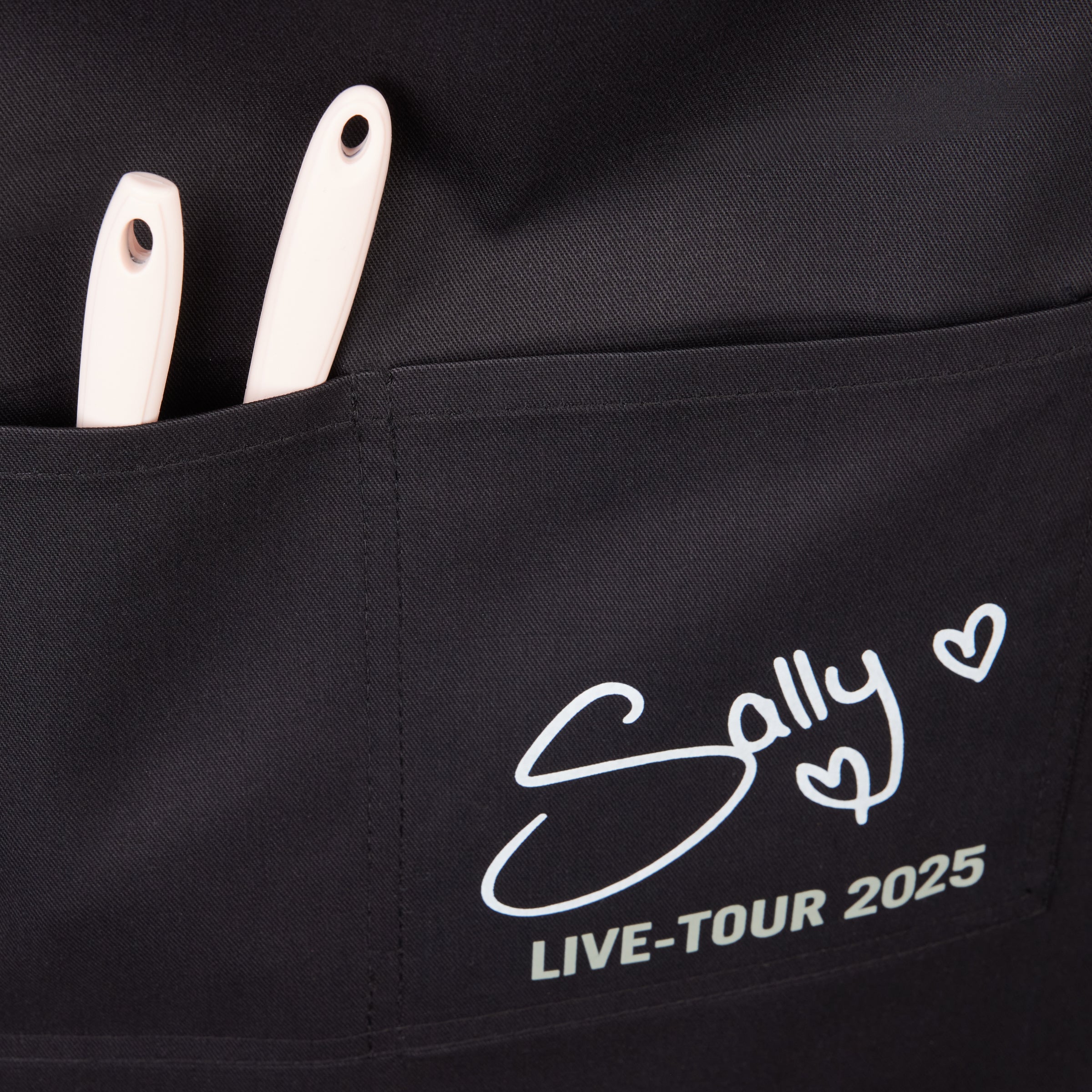 Sallys Live-Tour Schürze