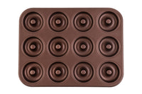 Ein kupferfarbenes Donutblech