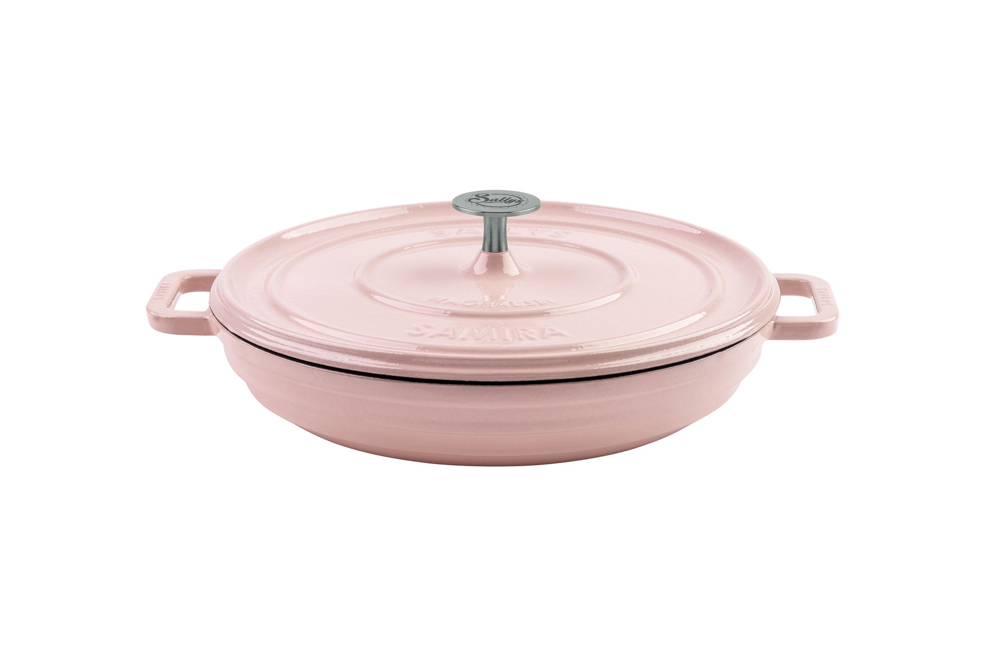 Ein flacher Gusseisentopf in der Farbe rosa