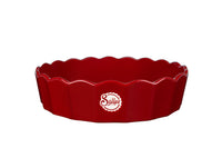 Eine rote, runde Stoneware-Ofenform