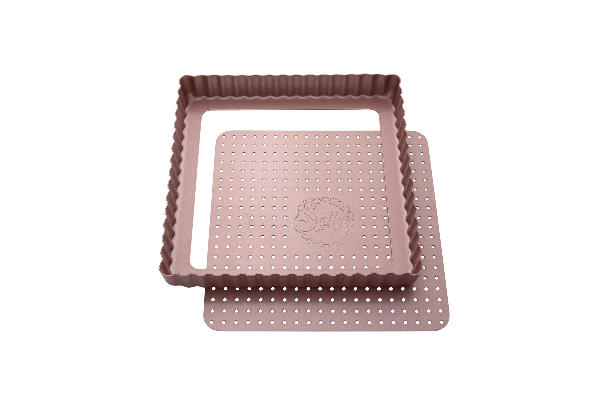 Eine rosefarbene, quadratische Tarteform mit perforiertem Hebeboden